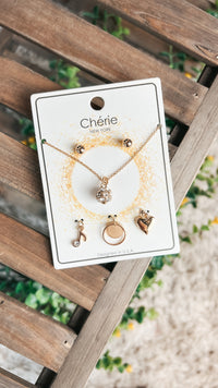 Gold necklace and earring set with 4 charms