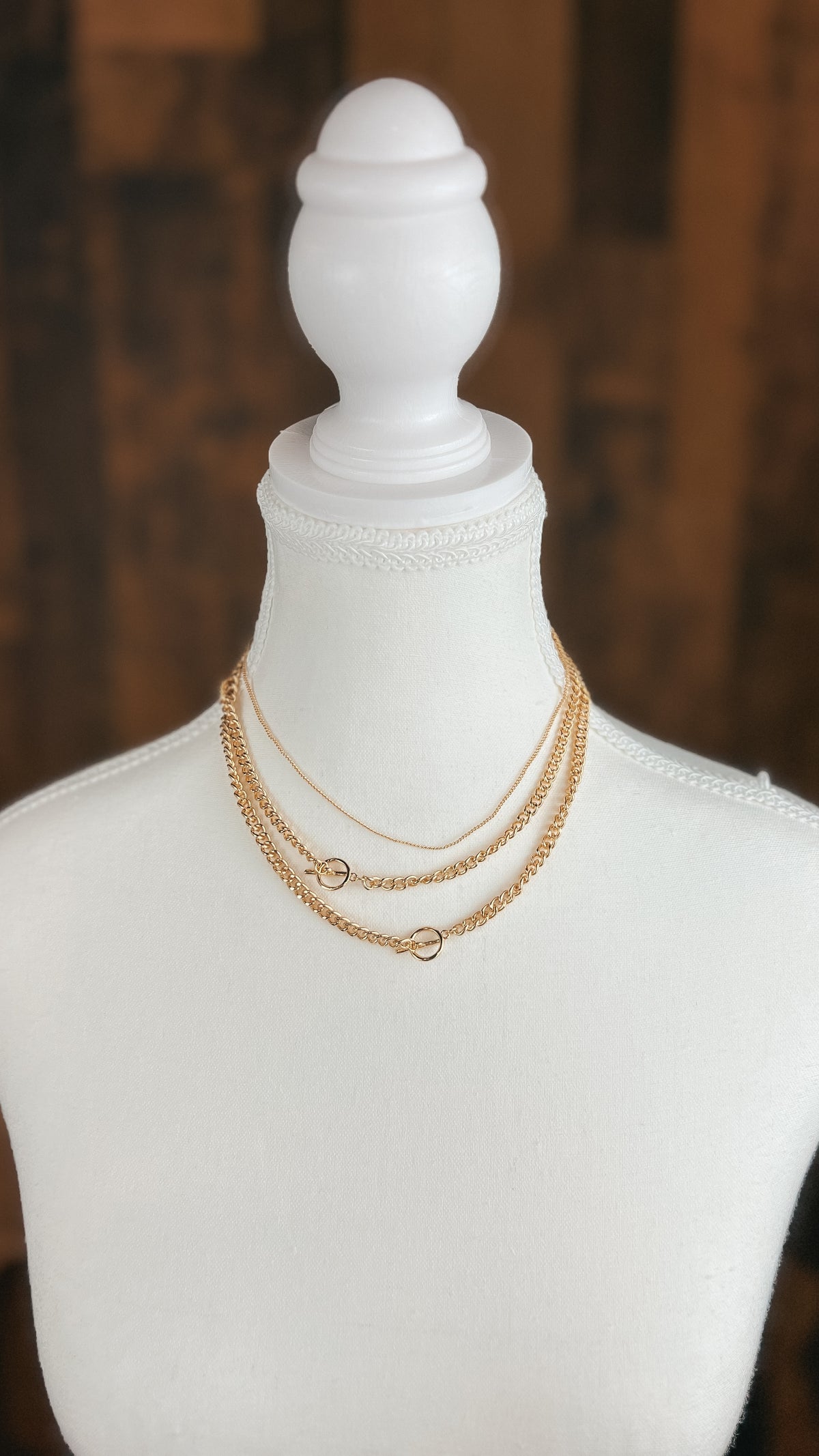 Gold triple chain necklace