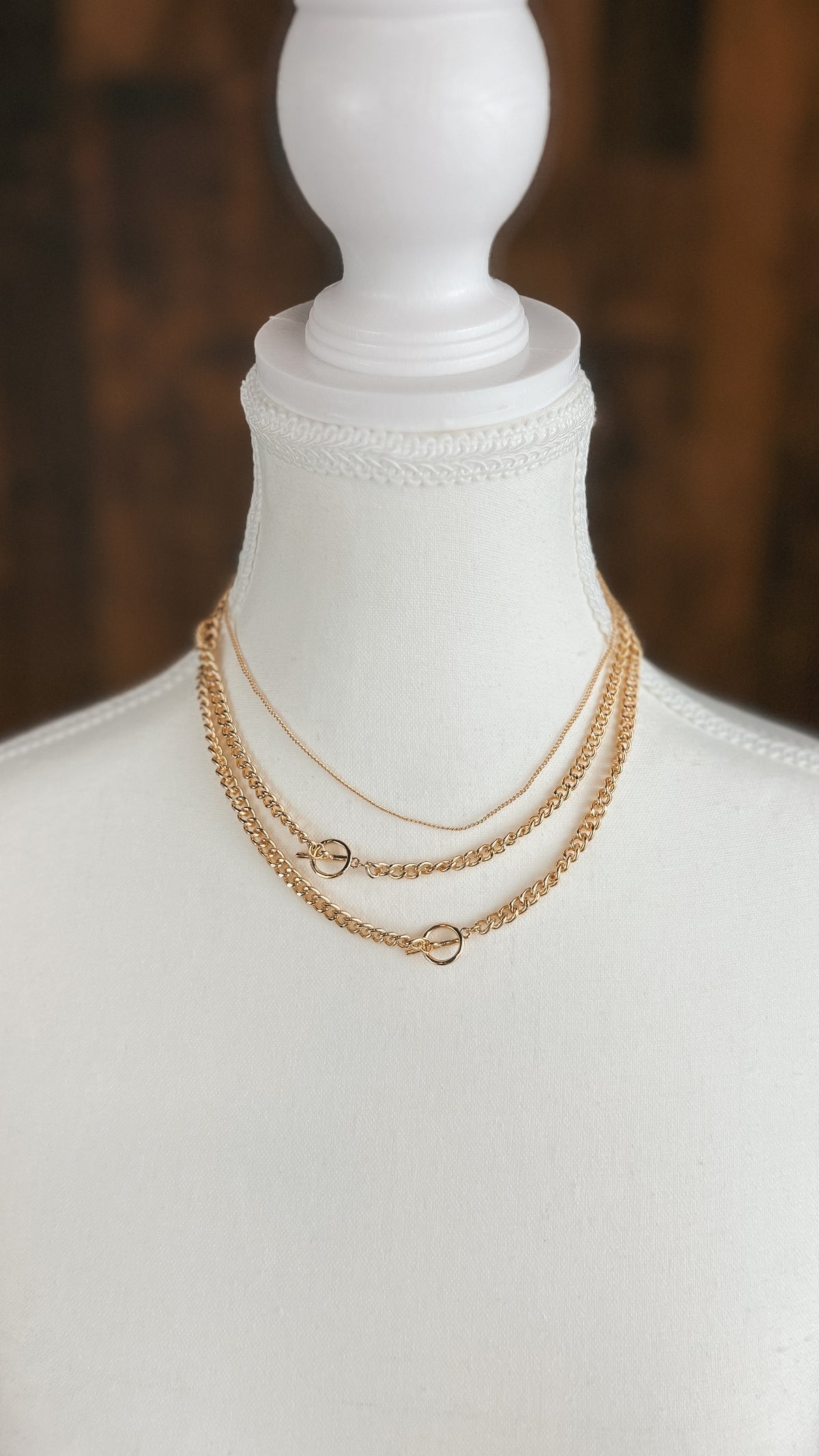 Gold triple chain necklace