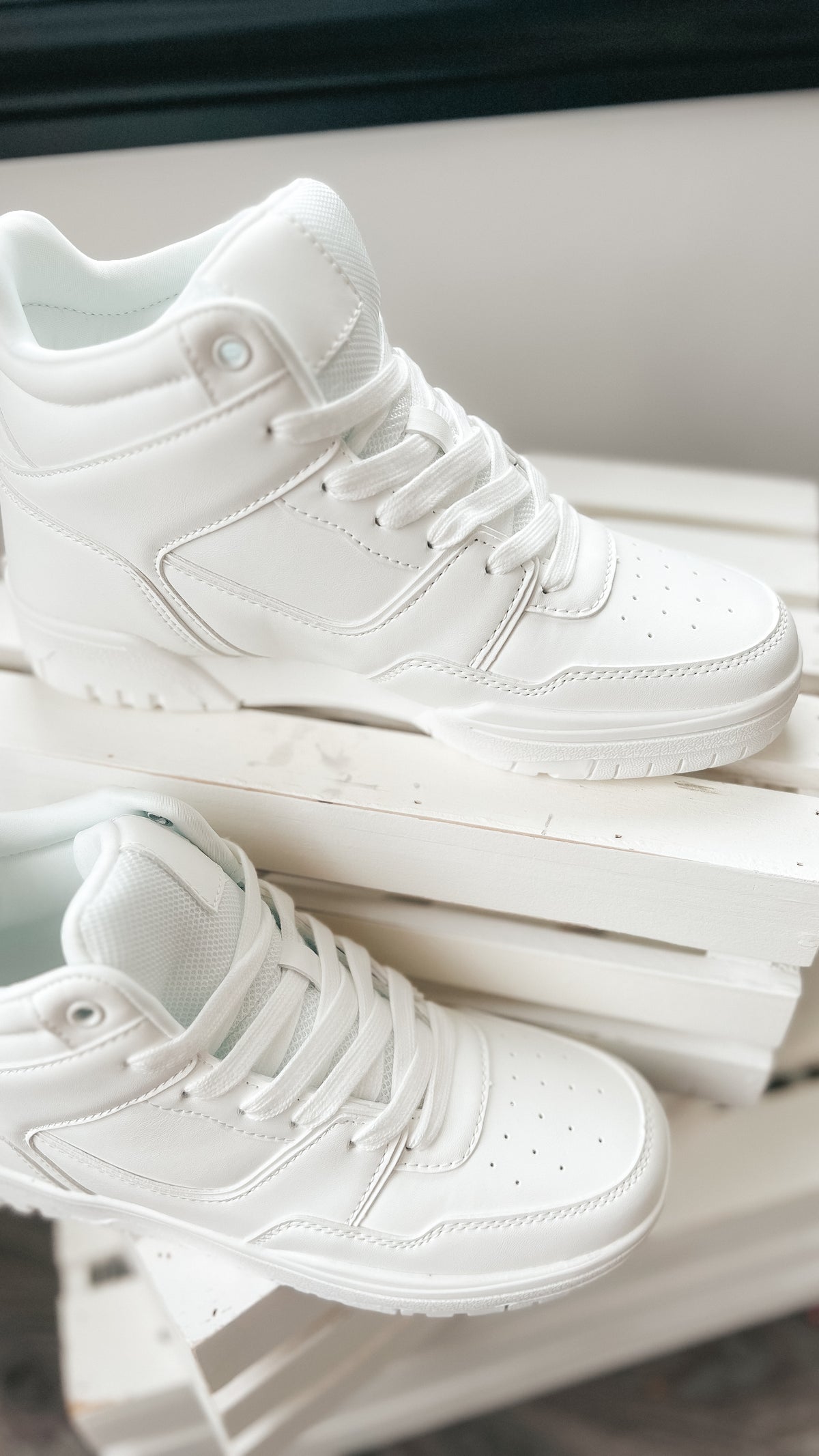 white lace up high top sneakers