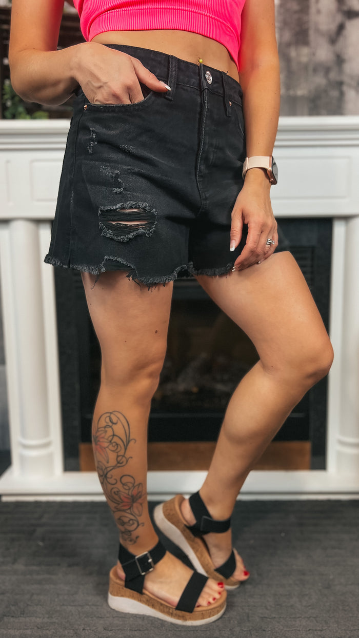 distressed black denim shorts